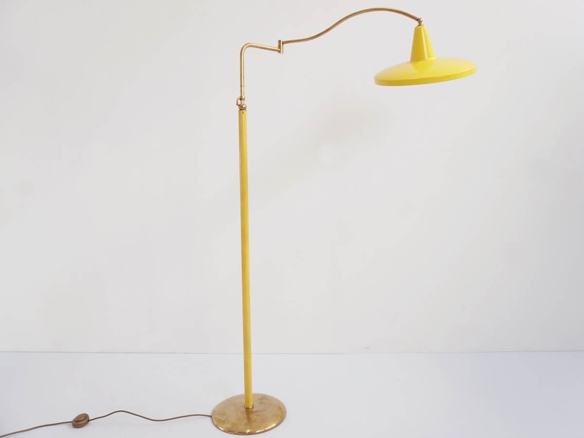 Adjustable Yellow and brass floor lamp