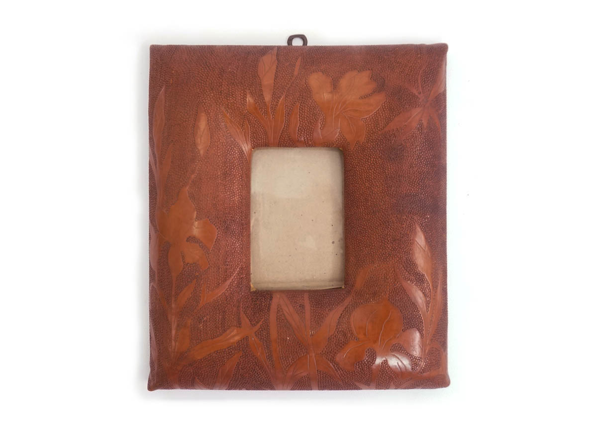 Flowers textured leather swollen frame