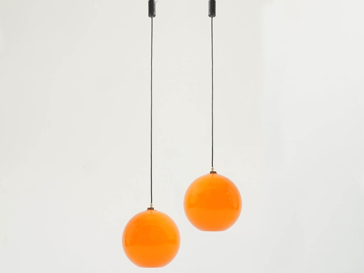 Pair of Orange Power Ball hanging light