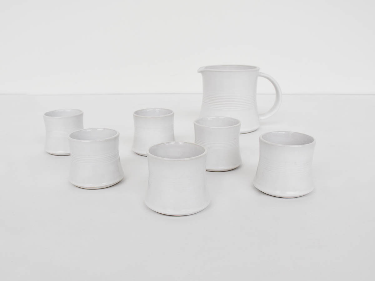 White Glazed Ceramic Pitcher and Glasses