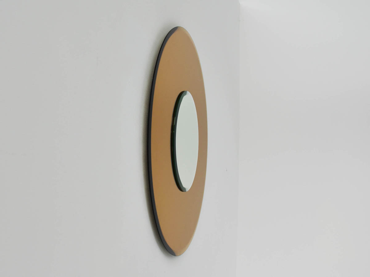 Miroir rond avec cadre en verre coloré mod. 1969