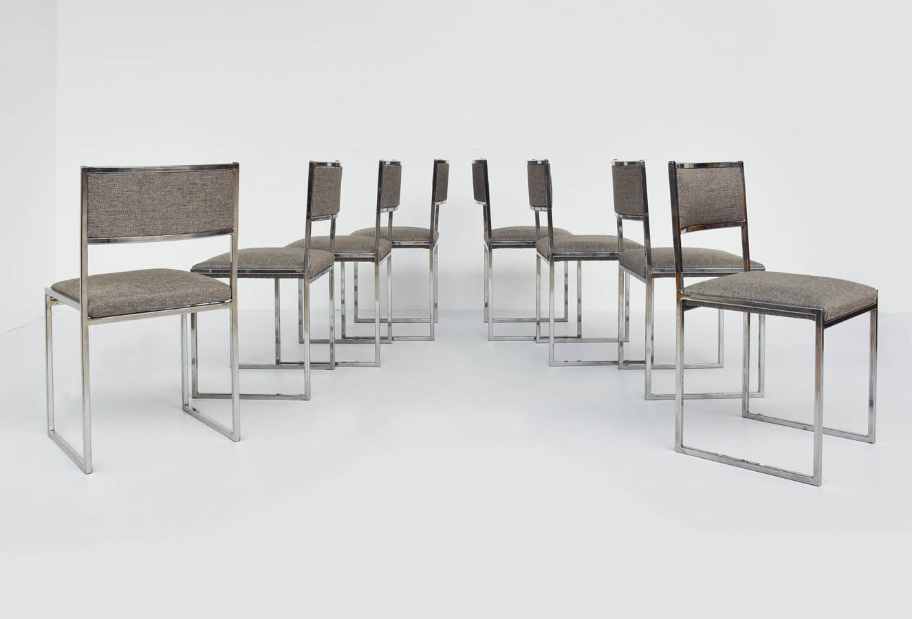 8 Minimal Chairs in Chrome with Brass Detail