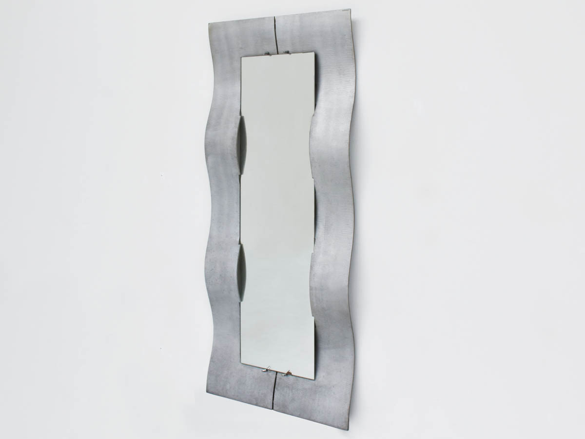 Brutalistic large mirror with aluminium scratches and waves frame