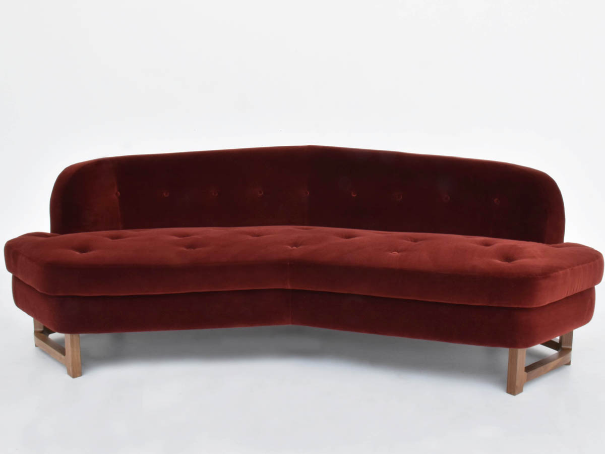 Elegant architectural sofa model Janus, in Dedar velvet
