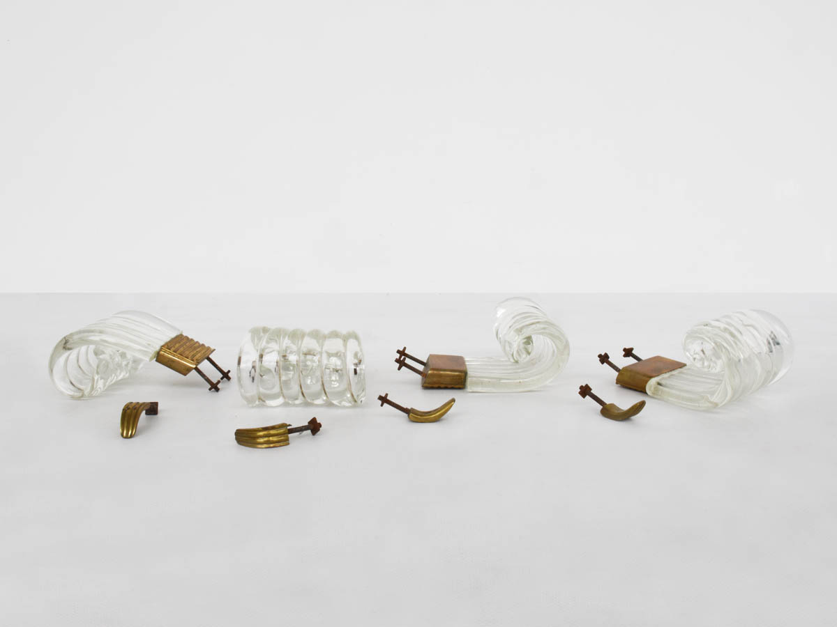 Massive glass and brass wall-mounted coat rack