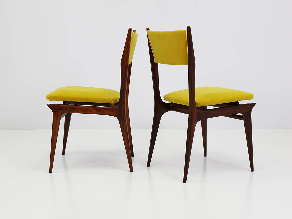 Two chairs made of rosewood and lemon-yellow velvet